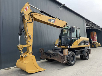 Excavadora de ruedas Caterpillar M322D: foto 1