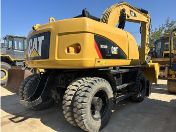 Excavadora de ruedas CATERPILLAR M318: foto 2