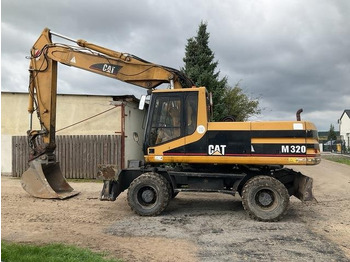 Excavadora de ruedas CATERPILLAR M320