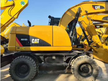 Excavadora de ruedas CATERPILLAR 315D
