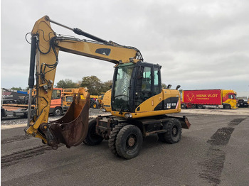 Excavadora de ruedas CATERPILLAR M313D