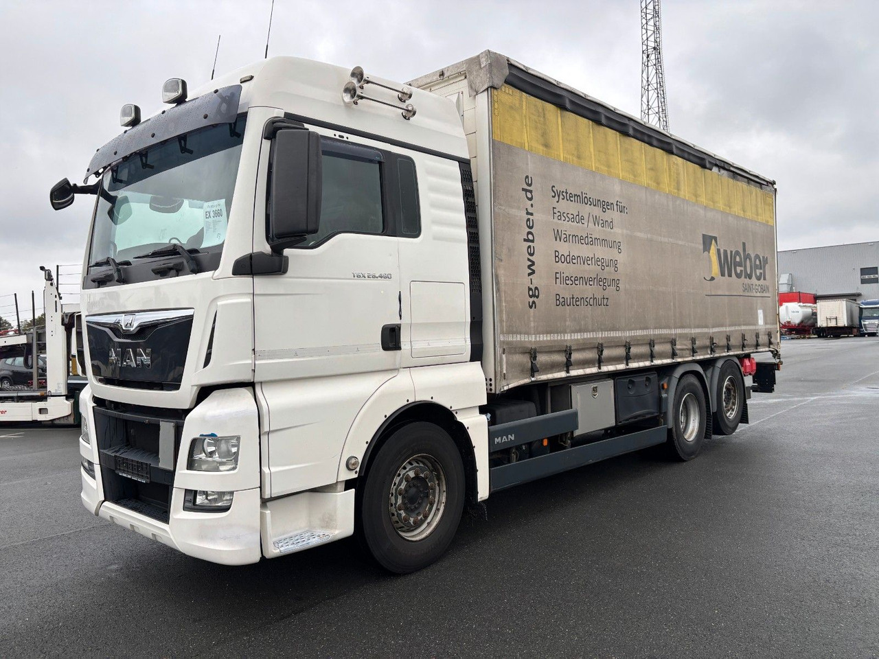 MAN TGX 26.480 mit Ladebordwand - Camión lona: foto 1 MAN TGX 26.480 mit Ladebordwand - Camión lona: foto 1