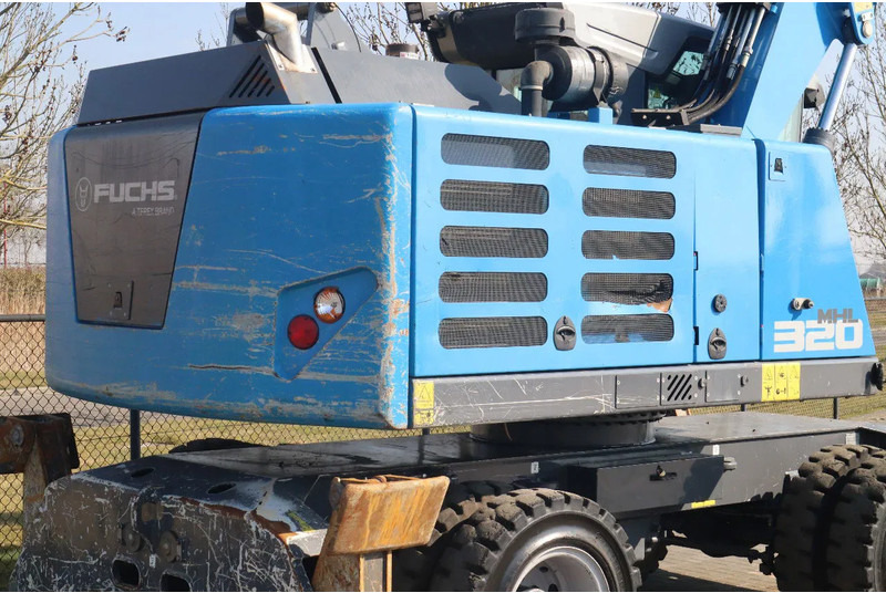 Manipulador de materiales Fuchs MHL 320 | PEEL GRAB | UMSCHLAG | GOOD TIRES: foto 8 Manipulador de materiales Fuchs MHL 320 | PEEL GRAB | UMSCHLAG | GOOD TIRES: foto 8