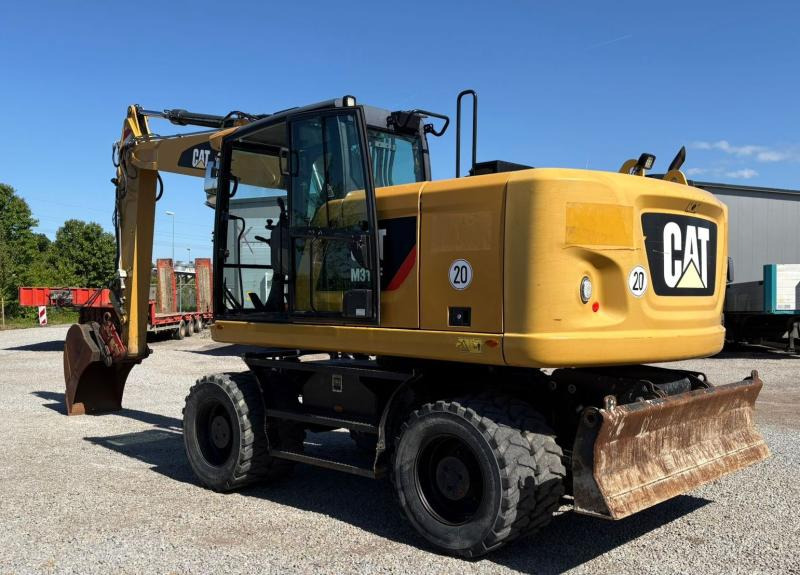 Caterpillar M318F - Excavadora de ruedas: foto 1 Caterpillar M318F - Excavadora de ruedas: foto 1
