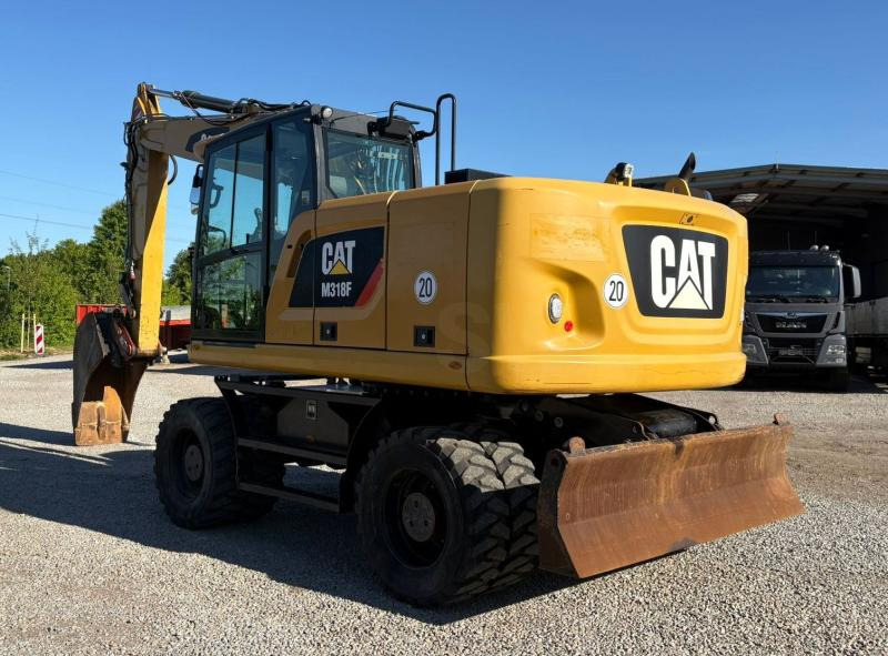 Caterpillar M318F - Excavadora de ruedas: foto 1 Caterpillar M318F - Excavadora de ruedas: foto 1