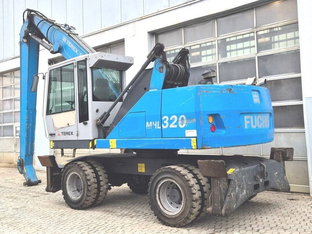 Fuchs MHL 320 D - Manipulador de materiales: foto 3 Fuchs MHL 320 D - Manipulador de materiales: foto 3