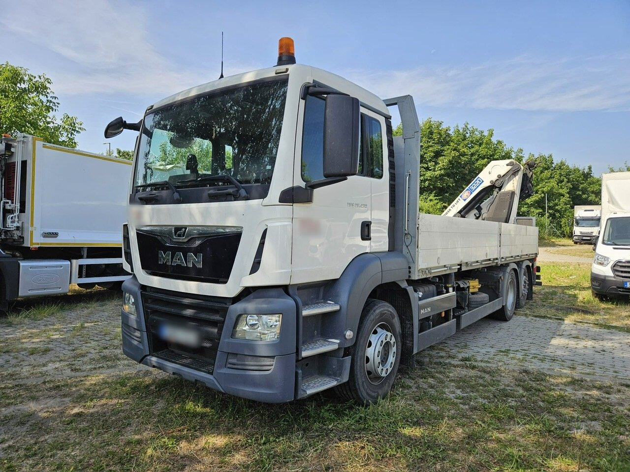 MAN TGS 26.430 6x2-4 BL TGS 26.430 6x2-4 BL, Lenk-/Liftachse, Heckkran HMF 3220K3, Funk - Camión grúa, Camión caja abierta: foto 1 MAN TGS 26.430 6x2-4 BL TGS 26.430 6x2-4 BL, Lenk-/Liftachse, Heckkran HMF 3220K3, Funk - Camión grúa, Camión caja abierta: foto 1