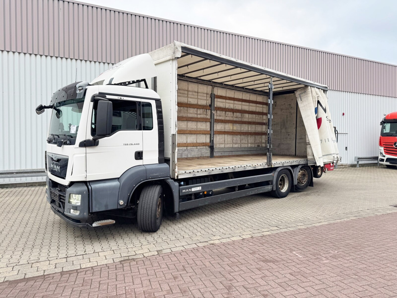 MAN TGS 26.440 6x2-4 LL TGS 26.440 6x2-4 LL, Lenk-/Liftachse, Edscha, Aufnahme für Mitnahmestapler - Camión caja abierta: foto 1 MAN TGS 26.440 6x2-4 LL TGS 26.440 6x2-4 LL, Lenk-/Liftachse, Edscha, Aufnahme für Mitnahmestapler - Camión caja abierta: foto 1