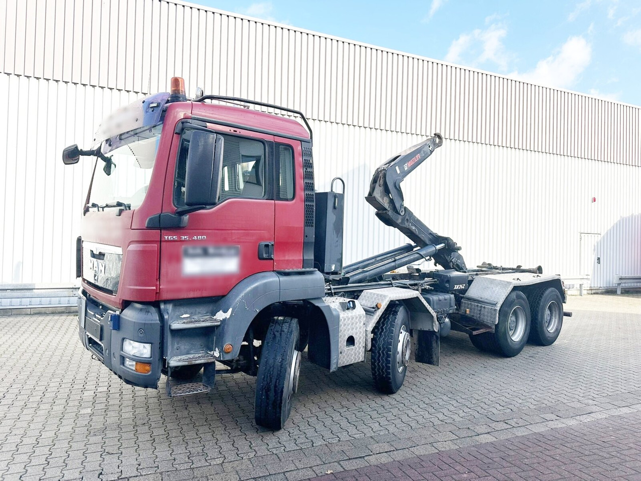MAN TGS 35.480 8X4 BL TGS 35.400 8x4 BL, Schub-Knick bis 6,5m Container - Camión multibasculante: foto 1 MAN TGS 35.480 8X4 BL TGS 35.400 8x4 BL, Schub-Knick bis 6,5m Container - Camión multibasculante: foto 1