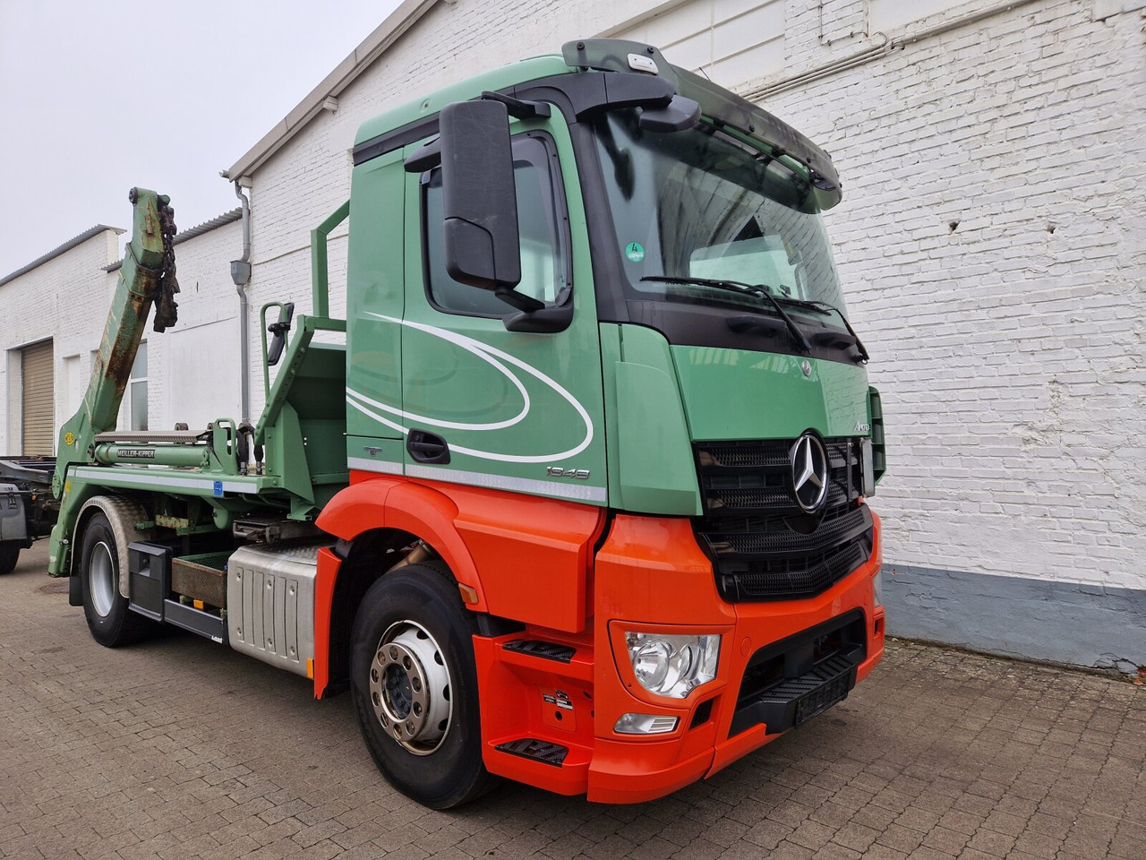 Mercedes-Benz Antos 1848 L 4x2 Antos 1848 L 4x2, Meiller AK 12 MTG Teleskop, Funk, Retarder, Klima, Standhzg., - Camión portacontenedor de cadenas: foto 1 Mercedes-Benz Antos 1848 L 4x2 Antos 1848 L 4x2, Meiller AK 12 MTG Teleskop, Funk, Retarder, Klima, Standhzg., - Camión portacontenedor de cadenas: foto 1