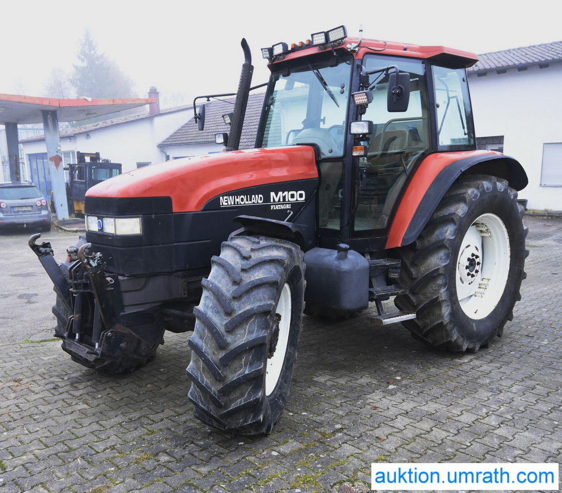 NEW HOLLAND M100 4x4 - Tractor: foto 1 NEW HOLLAND M100 4x4 - Tractor: foto 1