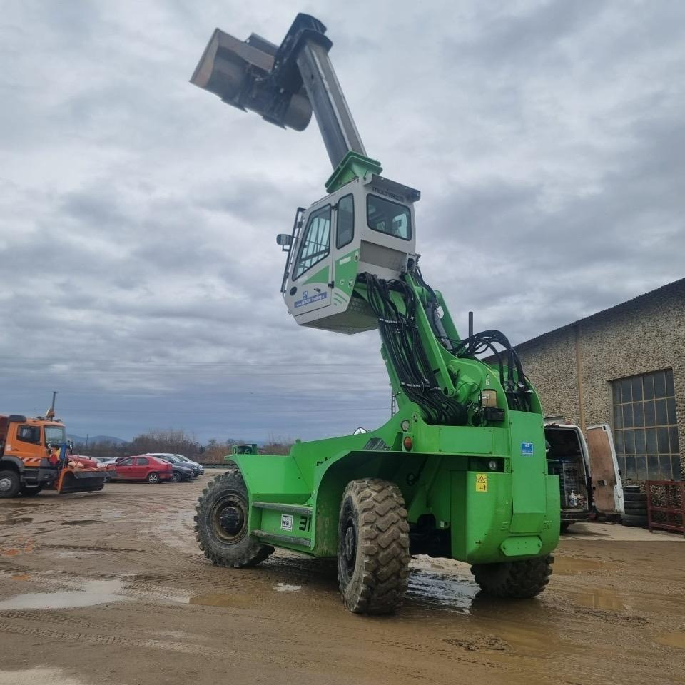 Sennebogen Typ 310 Multiloader - Manipulador telescópico: foto 1 Sennebogen Typ 310 Multiloader - Manipulador telescópico: foto 1