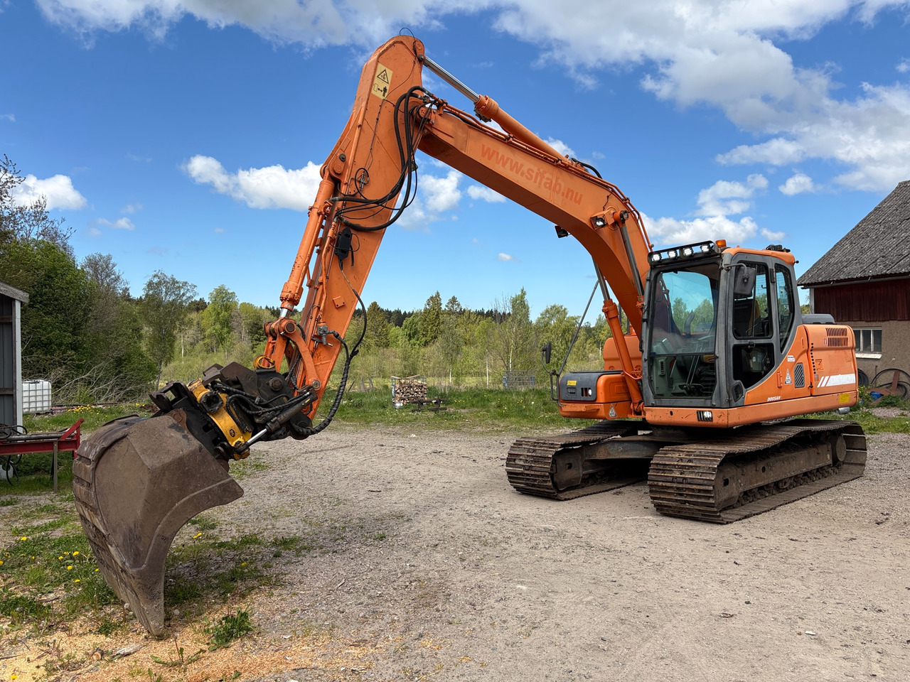 Doosan DX140LC - Excavadora: foto 1 Doosan DX140LC - Excavadora: foto 1