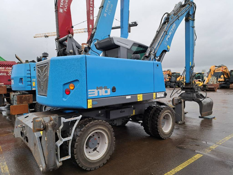 Fuchs MHL 310 - Manipulador de materiales: foto 1 Fuchs MHL 310 - Manipulador de materiales: foto 1