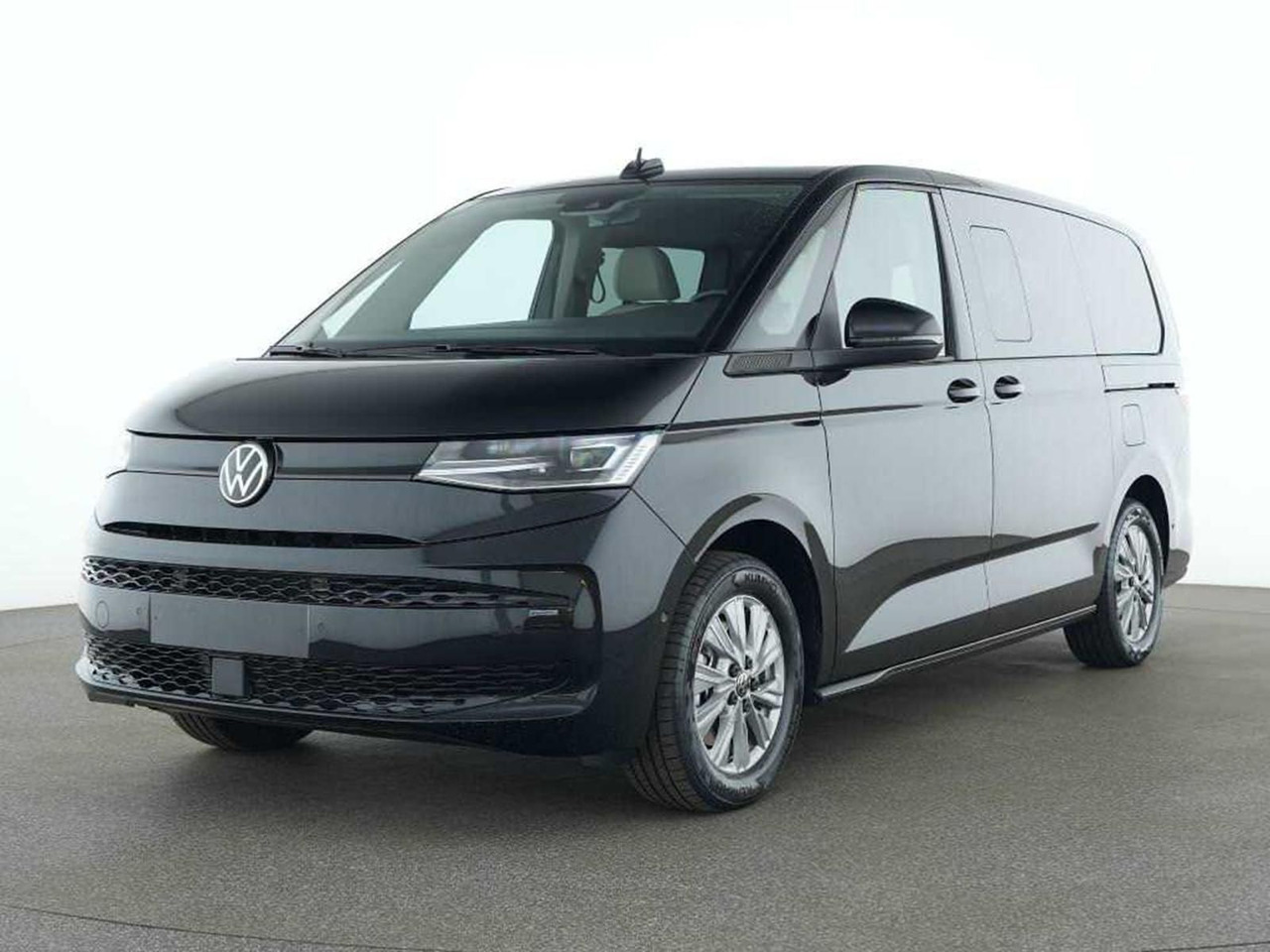 Volkswagen T7 Multivan eHybrid lang 4MOTION NAVI AHK ACC - Minibús, Furgoneta de pasajeros: foto 1 Volkswagen T7 Multivan eHybrid lang 4MOTION NAVI AHK ACC - Minibús, Furgoneta de pasajeros: foto 1