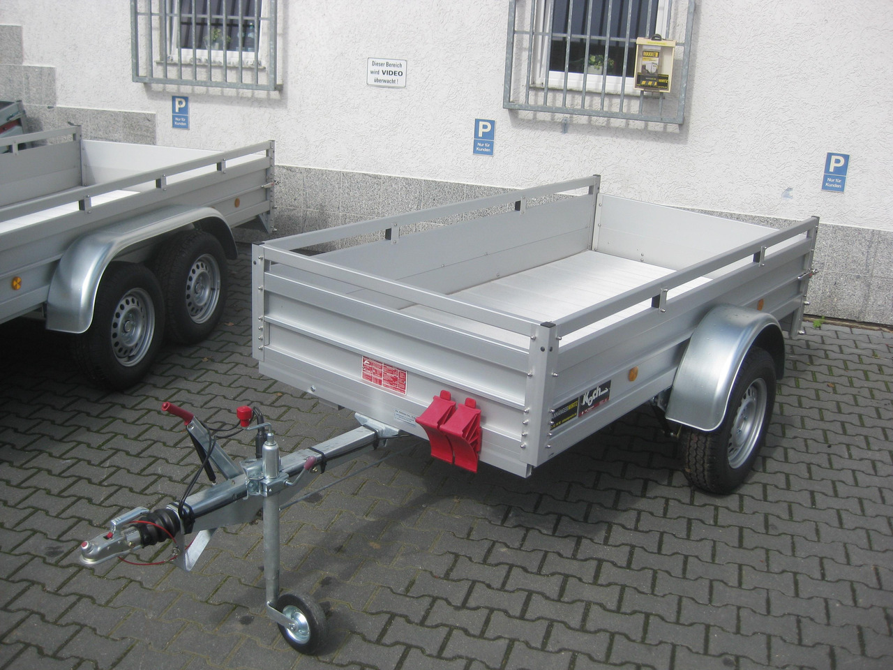 PKW Anhänger Koch Aluline+ 4.13 250x125x44cm ALUBODEN (S) 1300kg 100 km/H Online Abverkauf - Remolque de coche: foto 1 PKW Anhänger Koch Aluline+ 4.13 250x125x44cm ALUBODEN (S) 1300kg 100 km/H Online Abverkauf - Remolque de coche: foto 1
