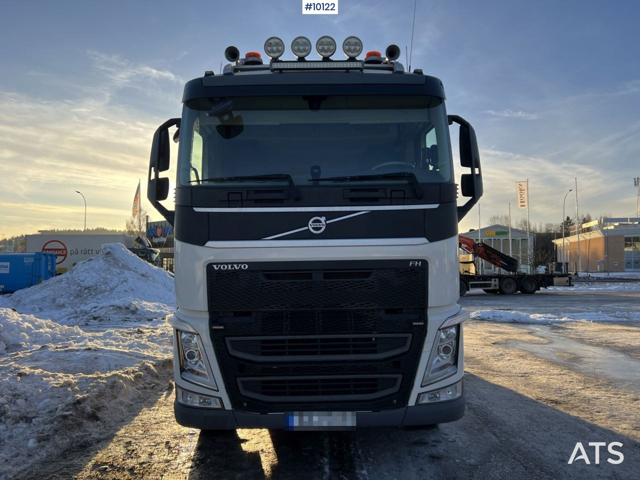 Volvo FH 8*4 Tridem Hooklift with flatbed - Camión multibasculante: foto 2 Volvo FH 8*4 Tridem Hooklift with flatbed - Camión multibasculante: foto 2