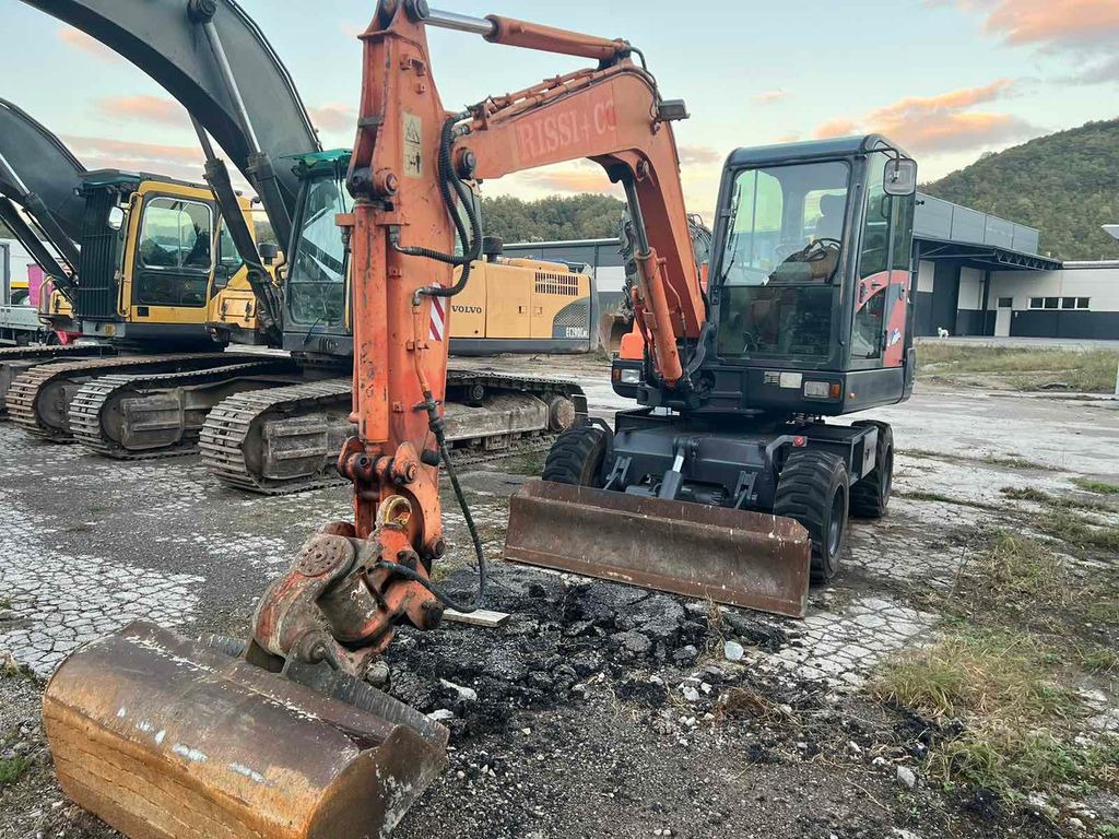 Doosan S55W-V Plus, 4800hours - Excavadora de ruedas: foto 1 Doosan S55W-V Plus, 4800hours - Excavadora de ruedas: foto 1