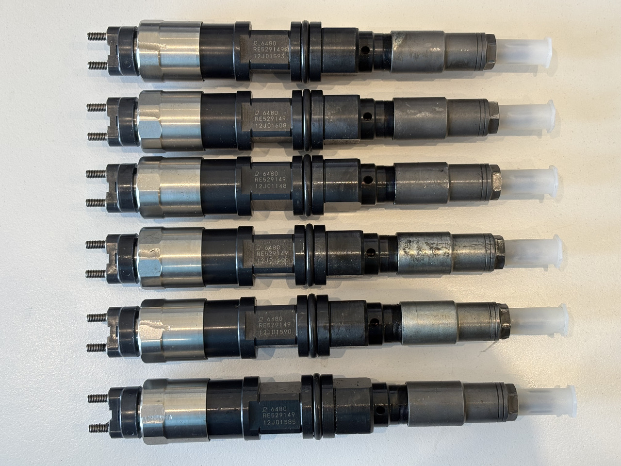 JOHN DEERE Wtryskiwacz RE529149, RE528407, RE546776 Po regeneracji - Inyector para Maquinaria agrícola: foto 3 JOHN DEERE Wtryskiwacz RE529149, RE528407, RE546776 Po regeneracji - Inyector para Maquinaria agrícola: foto 3