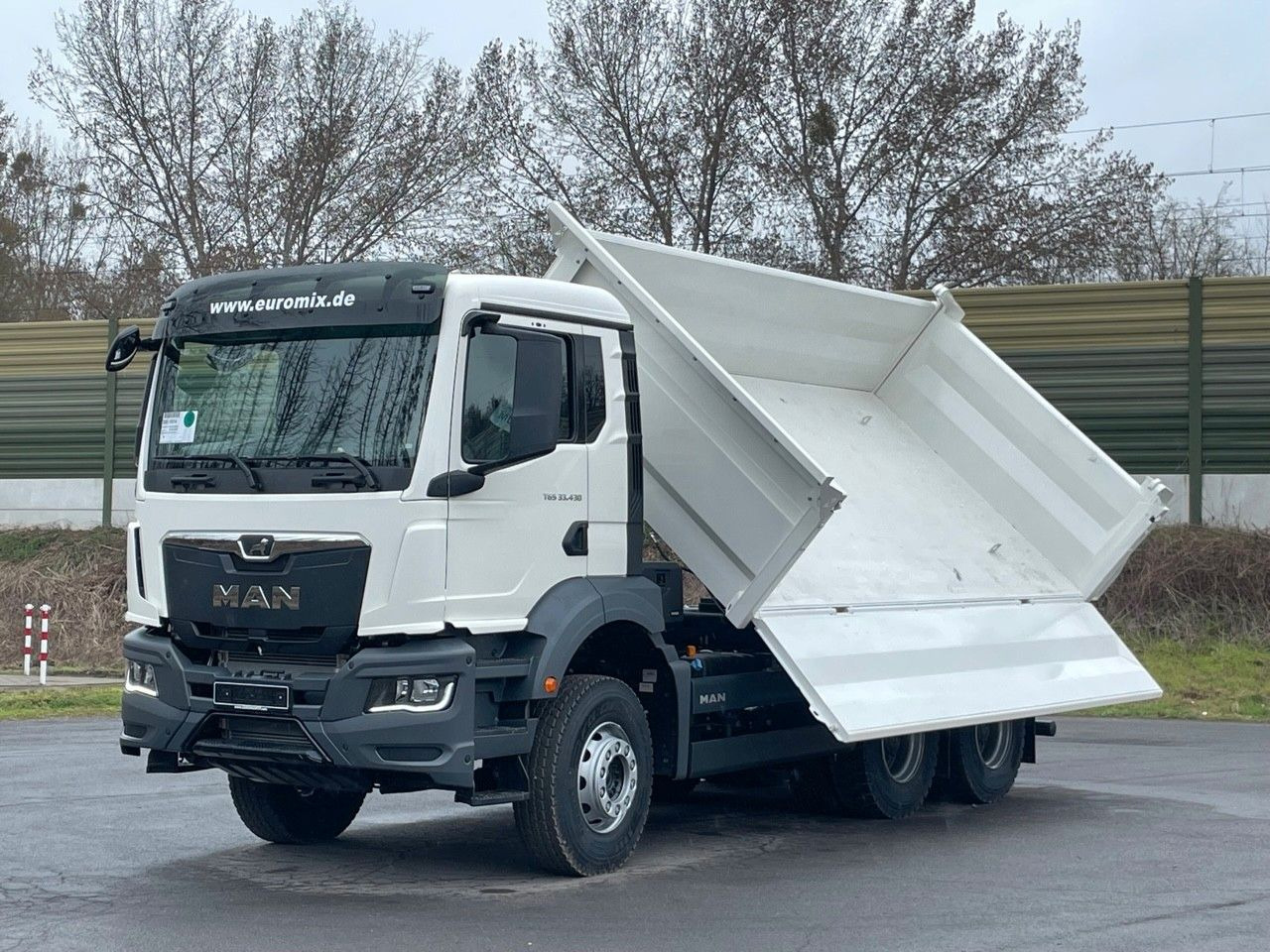 MAN TGS 33.440 6x4 /Euro6 3-Seiten-Kipper EuromixMTP - Camión volquete: foto 1 MAN TGS 33.440 6x4 /Euro6 3-Seiten-Kipper EuromixMTP - Camión volquete: foto 1