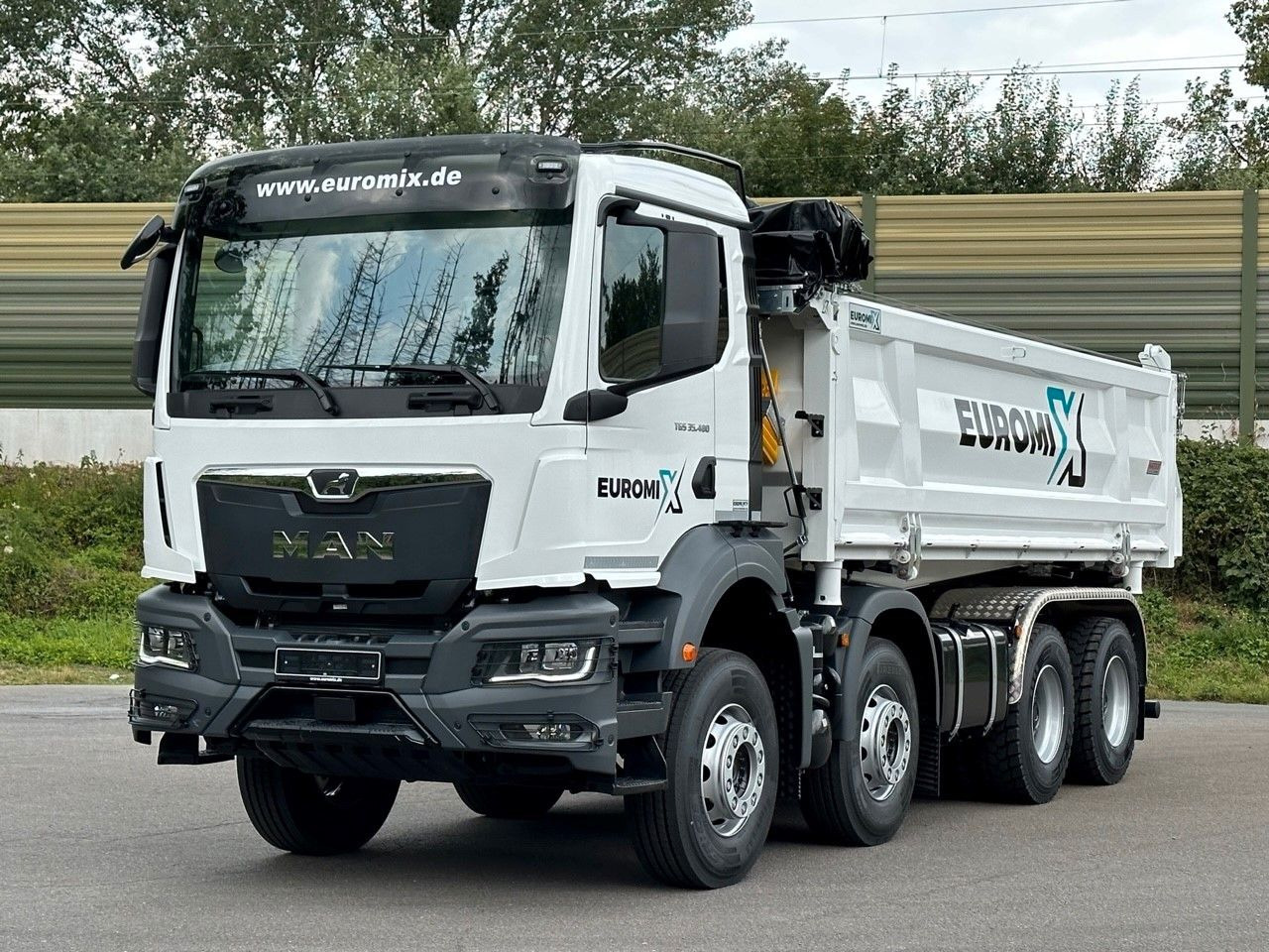 MAN TGS 35.480 8x4 EuromixMTP 3-Seiten-Kipper - Camión volquete: foto 1 MAN TGS 35.480 8x4 EuromixMTP 3-Seiten-Kipper - Camión volquete: foto 1