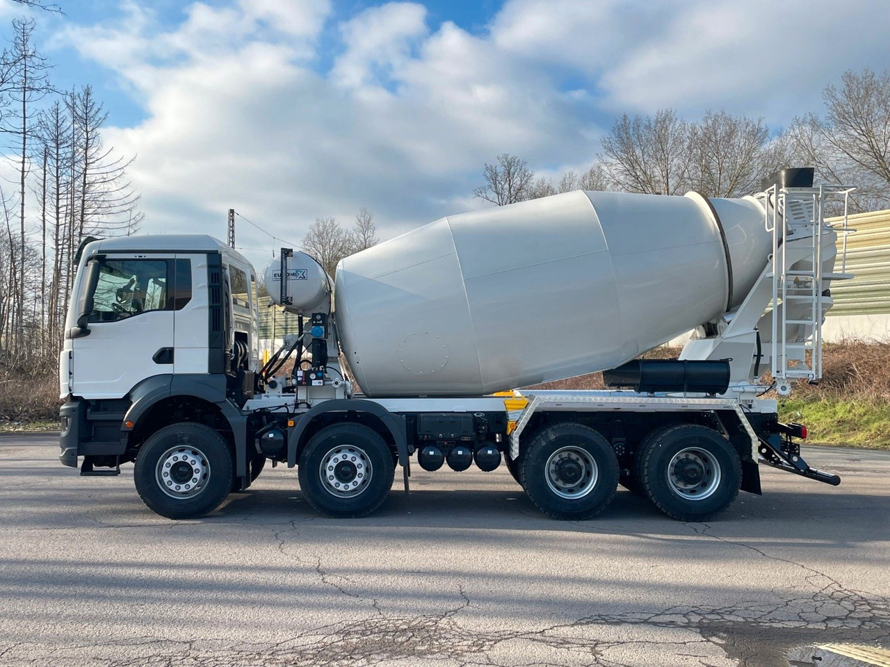 MAN TGS 41.400 8x4 / EuromixMTP EM 12m³ R / EURO 2 - Camión hormigonera: foto 4 MAN TGS 41.400 8x4 / EuromixMTP EM 12m³ R / EURO 2 - Camión hormigonera: foto 4