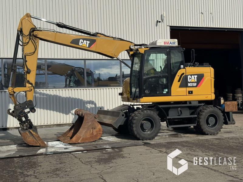 Caterpillar M315F - Excavadora de ruedas: foto 1 Caterpillar M315F - Excavadora de ruedas: foto 1