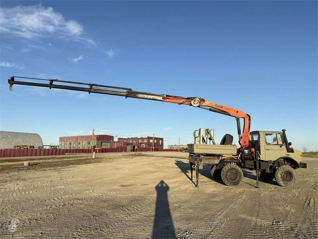Camión volquete Mercedes-Benz Unimog Palfinger PK 12000 18 m 6.8 t Radio: foto 1