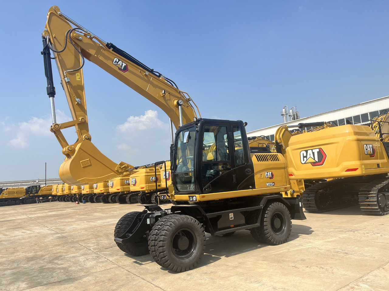 Caterpillar M315GC - Excavadora de ruedas: foto 1 Caterpillar M315GC - Excavadora de ruedas: foto 1