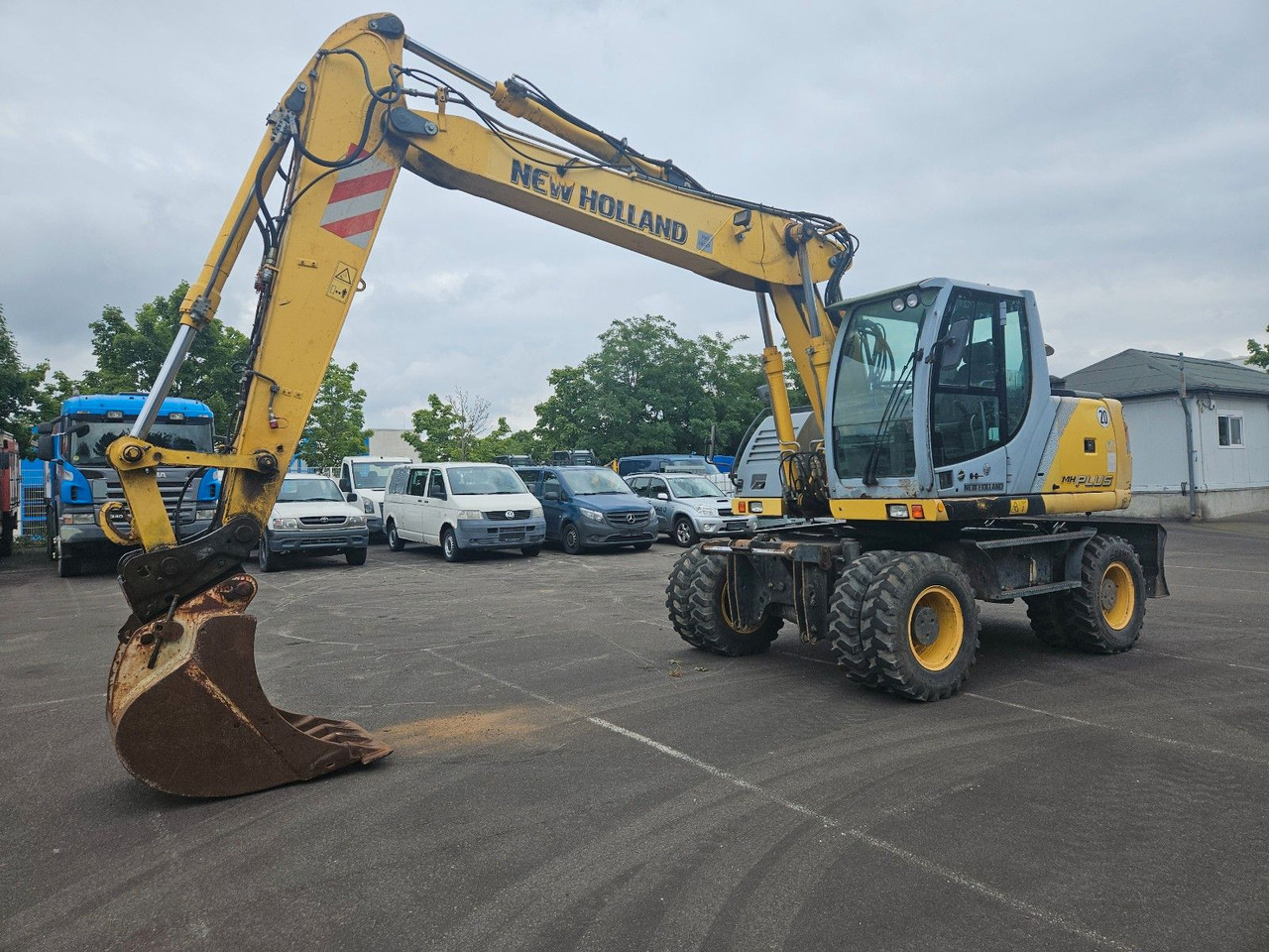New Holland MH Plus 18t Mobilbagger - Excavadora de ruedas: foto 1 New Holland MH Plus 18t Mobilbagger - Excavadora de ruedas: foto 1