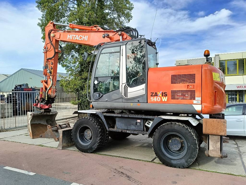 Hitachi ZX 140 W-3 mobiele graafmachine mobile excavator - Excavadora de ruedas: foto 1 Hitachi ZX 140 W-3 mobiele graafmachine mobile excavator - Excavadora de ruedas: foto 1
