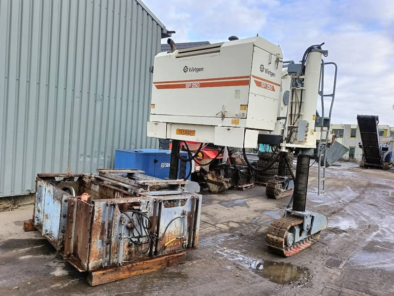 Wirtgen SP 250 500 beton bekisting machine sleep - Pavimentadora de asfalto: foto 4 Wirtgen SP 250 500 beton bekisting machine sleep - Pavimentadora de asfalto: foto 4