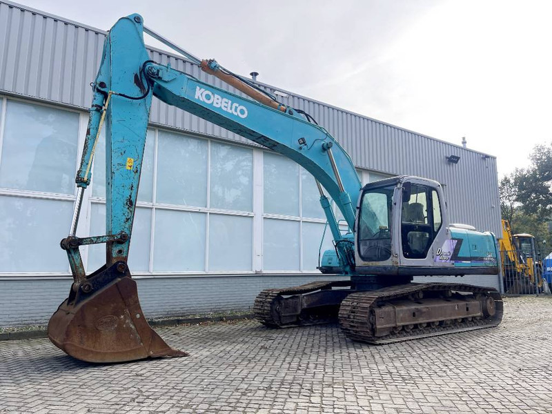 Kobelco SK 210 LC-6 E 2004 - Excavadora de cadenas: foto 1 Kobelco SK 210 LC-6 E 2004 - Excavadora de cadenas: foto 1