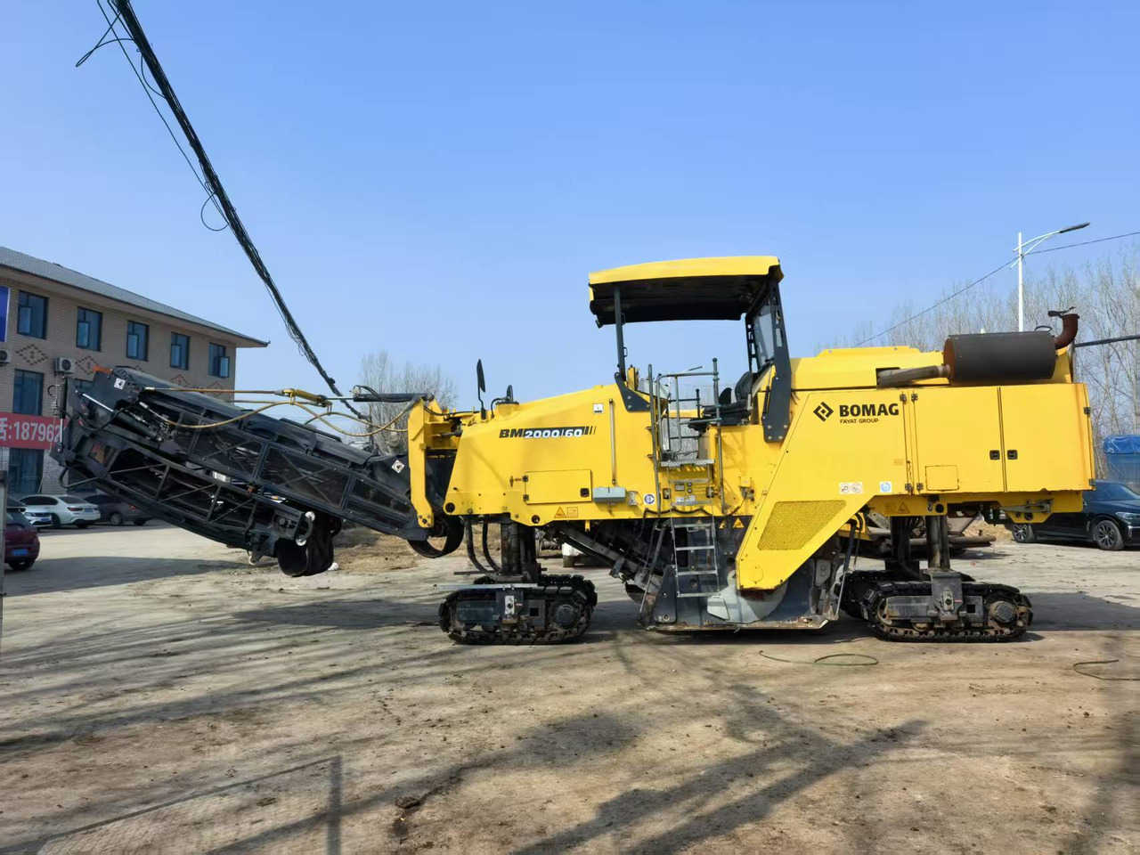 BOMAG Second Hand Asphalt Milling Machine BM2000/60 Asphalt Cold Milling Machine Price - Fresadora en frío: foto 2 BOMAG Second Hand Asphalt Milling Machine BM2000/60 Asphalt Cold Milling Machine Price - Fresadora en frío: foto 2