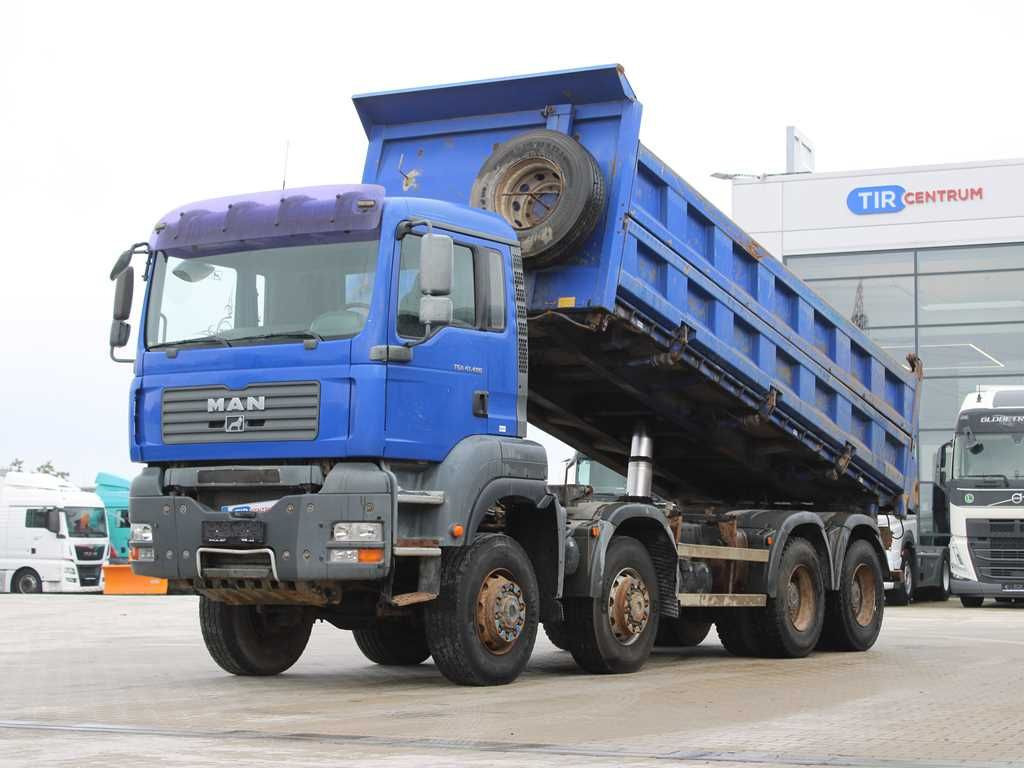 MAN TGA 41.480, 8X6, THREE-SIDED, EURO 3, RETARDER - Camión volquete: foto 1 MAN TGA 41.480, 8X6, THREE-SIDED, EURO 3, RETARDER - Camión volquete: foto 1