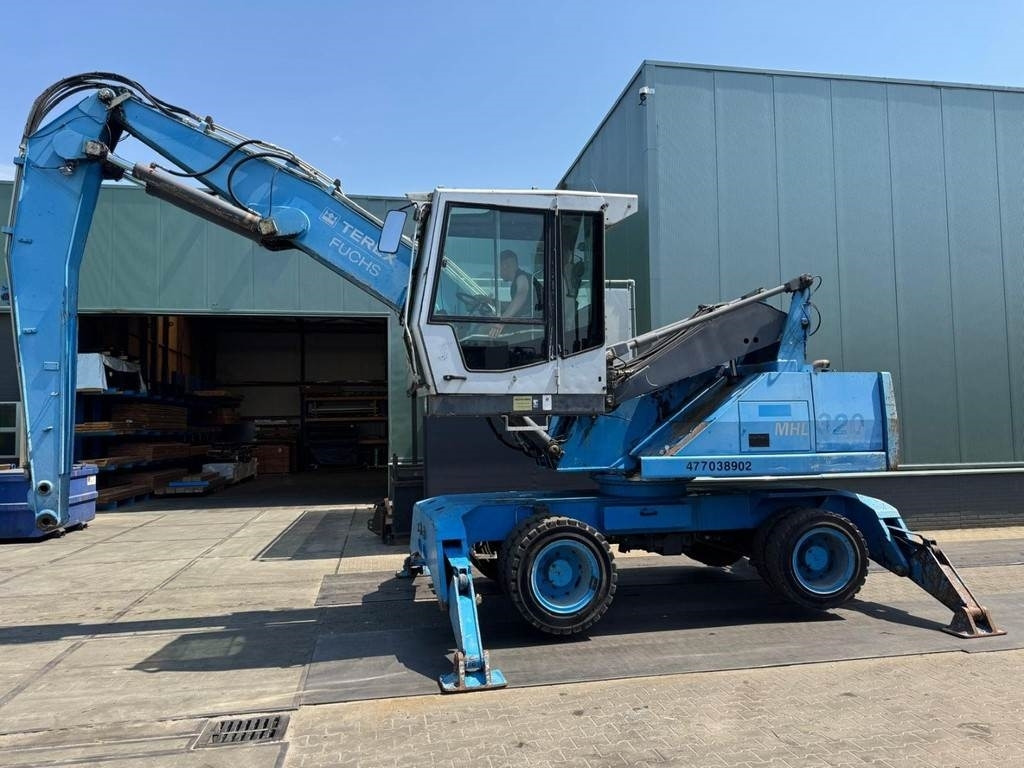 Fuchs MHL 320 - Manipulador de materiales: foto 2 Fuchs MHL 320 - Manipulador de materiales: foto 2