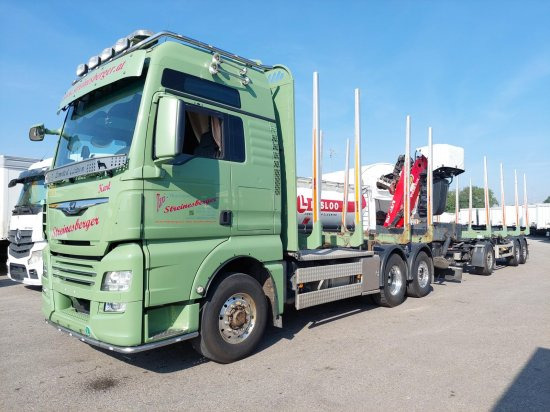 MAN TGX 26.500 6x4x4 Holztransporter, Motor Neu - Camión forestal, Camión grúa: foto 1 MAN TGX 26.500 6x4x4 Holztransporter, Motor Neu - Camión forestal, Camión grúa: foto 1