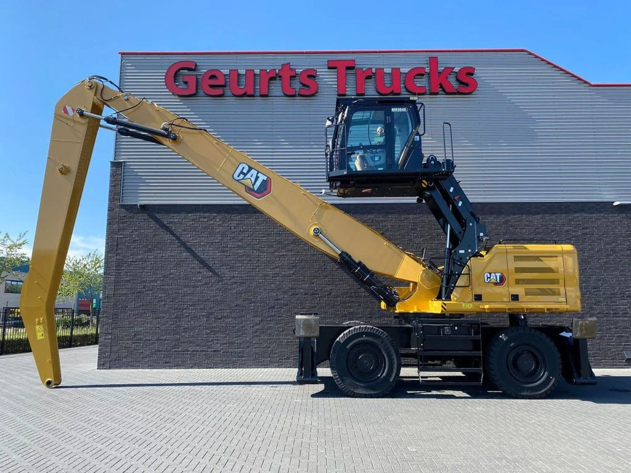 CAT MH3040 NEW MATERIAL HANDLER/UMSCHLAGBAGGER/OVERS - Grúa torre: foto 1 CAT MH3040 NEW MATERIAL HANDLER/UMSCHLAGBAGGER/OVERS - Grúa torre: foto 1