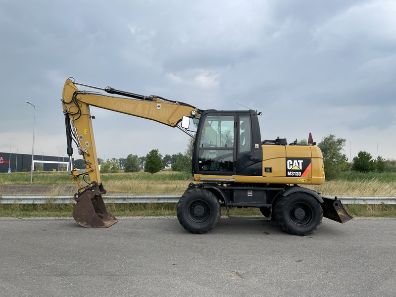 Caterpillar M313D - CE - Excavadora de ruedas: foto 1 Caterpillar M313D - CE - Excavadora de ruedas: foto 1