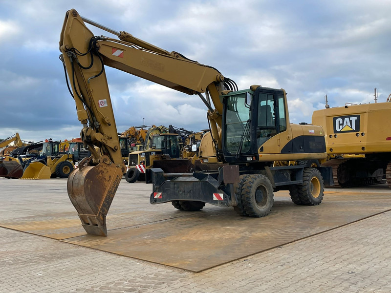 Caterpillar M318C - Excavadora de ruedas: foto 2 Caterpillar M318C - Excavadora de ruedas: foto 2