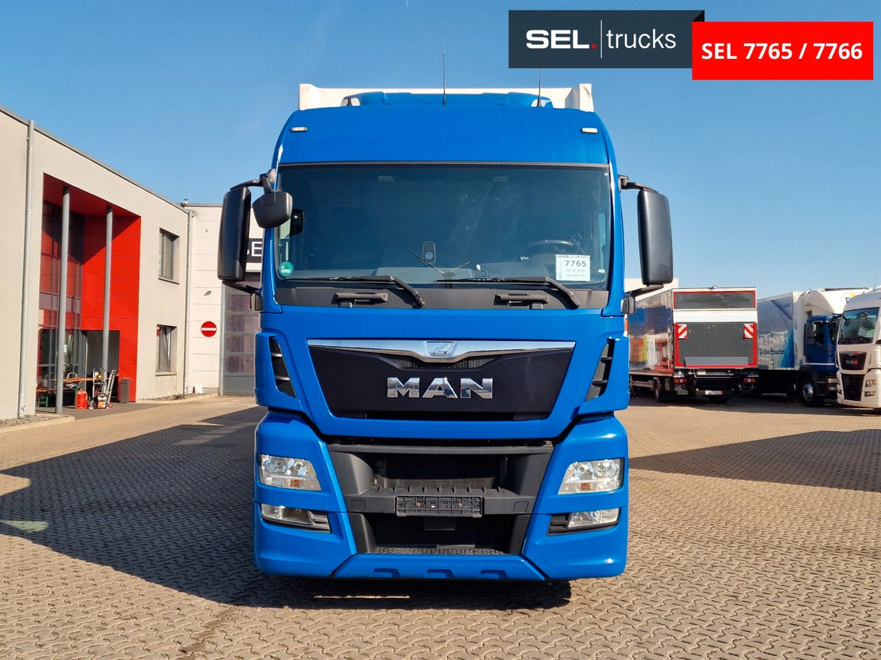 MAN TGX 18.440 4X2 LL-U/ Intarder /Hubdach/Durchlade - Camión lona: foto 2 MAN TGX 18.440 4X2 LL-U/ Intarder /Hubdach/Durchlade - Camión lona: foto 2