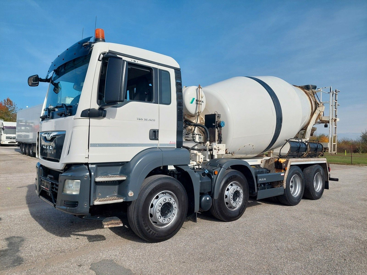 MAN TGS 32.420 BB Stetter 8x4 - Camión hormigonera: foto 1 MAN TGS 32.420 BB Stetter 8x4 - Camión hormigonera: foto 1