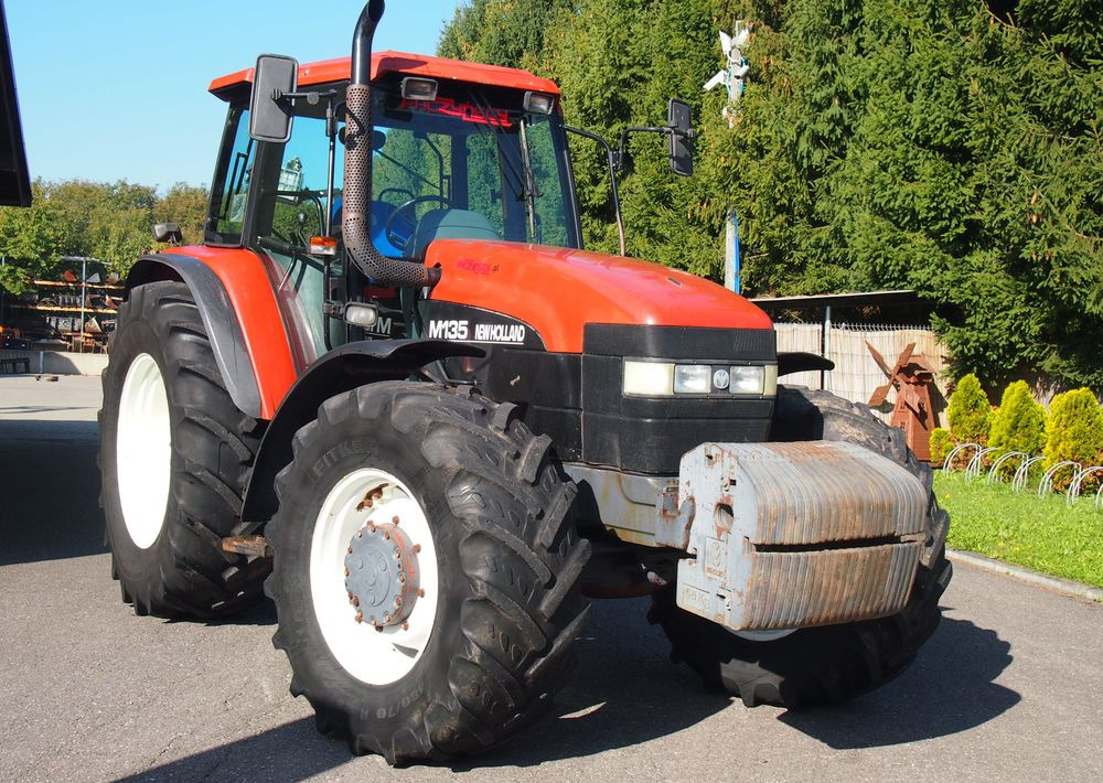Ciągnik New Holland NH M 135 1998 NEW HOLLAND TM M135 - Tractor: foto 1 Ciągnik New Holland NH M 135 1998 NEW HOLLAND TM M135 - Tractor: foto 1