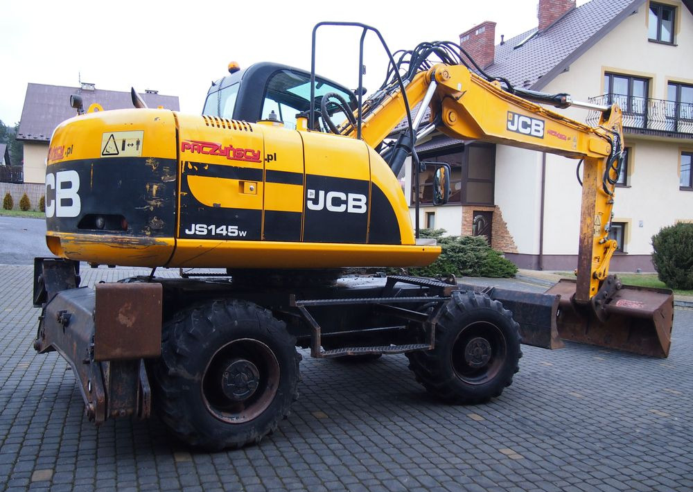Koparka kołowa JCB JS145W 2011 Koparka JCB - Excavadora de ruedas: foto 2 Koparka kołowa JCB JS145W 2011 Koparka JCB - Excavadora de ruedas: foto 2