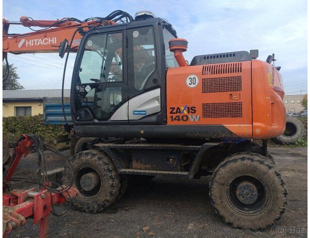 Hitachi Zaxis 140W-5B - Excavadora de ruedas: foto 1 Hitachi Zaxis 140W-5B - Excavadora de ruedas: foto 1