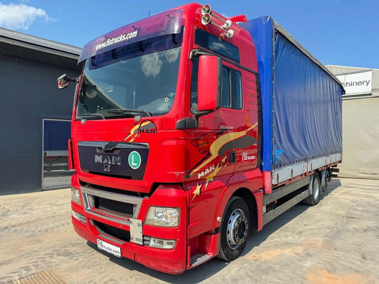 MAN TGX 26.440 6x2 box truck - retarder - lifting+steering axle - Camión caja cerrada: foto 1 MAN TGX 26.440 6x2 box truck - retarder - lifting+steering axle - Camión caja cerrada: foto 1