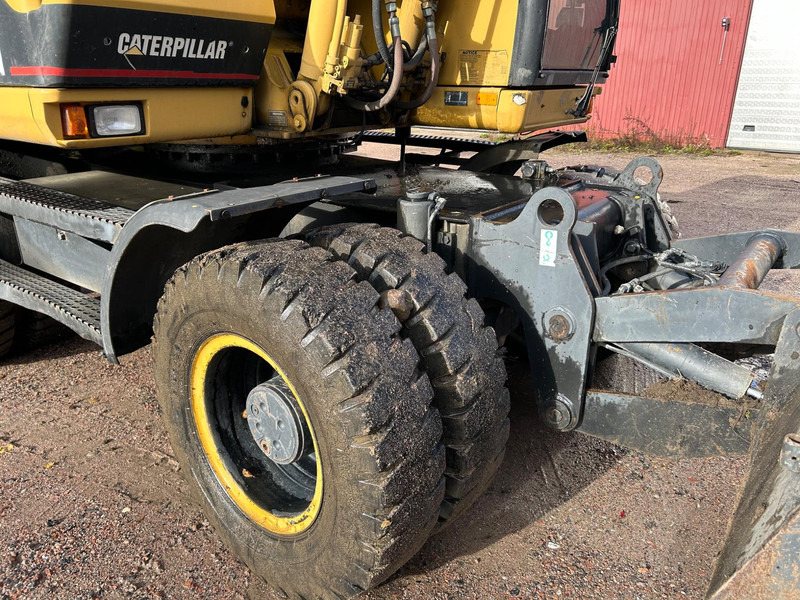 Excavadora de ruedas Caterpillar M312 Engcon EC20 tiltrotator: foto 15 Excavadora de ruedas Caterpillar M312 Engcon EC20 tiltrotator: foto 15