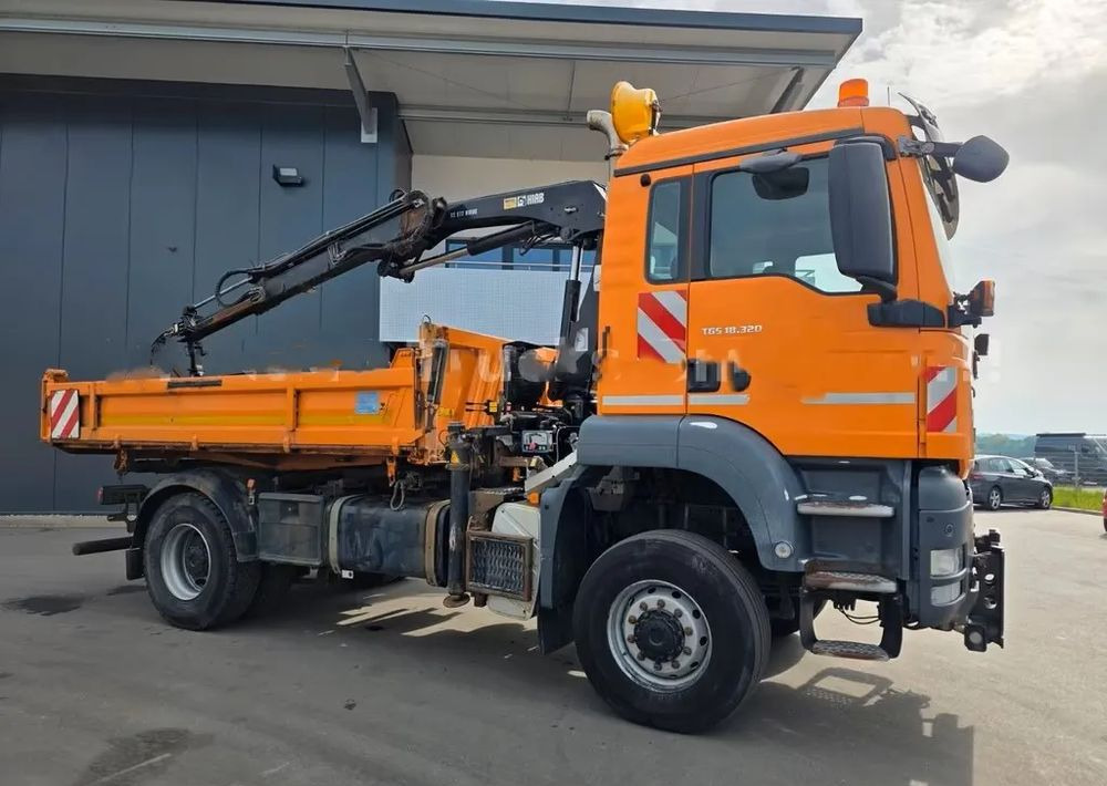 MAN TGS 18.320 4x4 – Wywrotka trójstronna Meiller + Kran HIAB | Komunalny | Euro 5 - Camión volquete: foto 1 MAN TGS 18.320 4x4 – Wywrotka trójstronna Meiller + Kran HIAB | Komunalny | Euro 5 - Camión volquete: foto 1