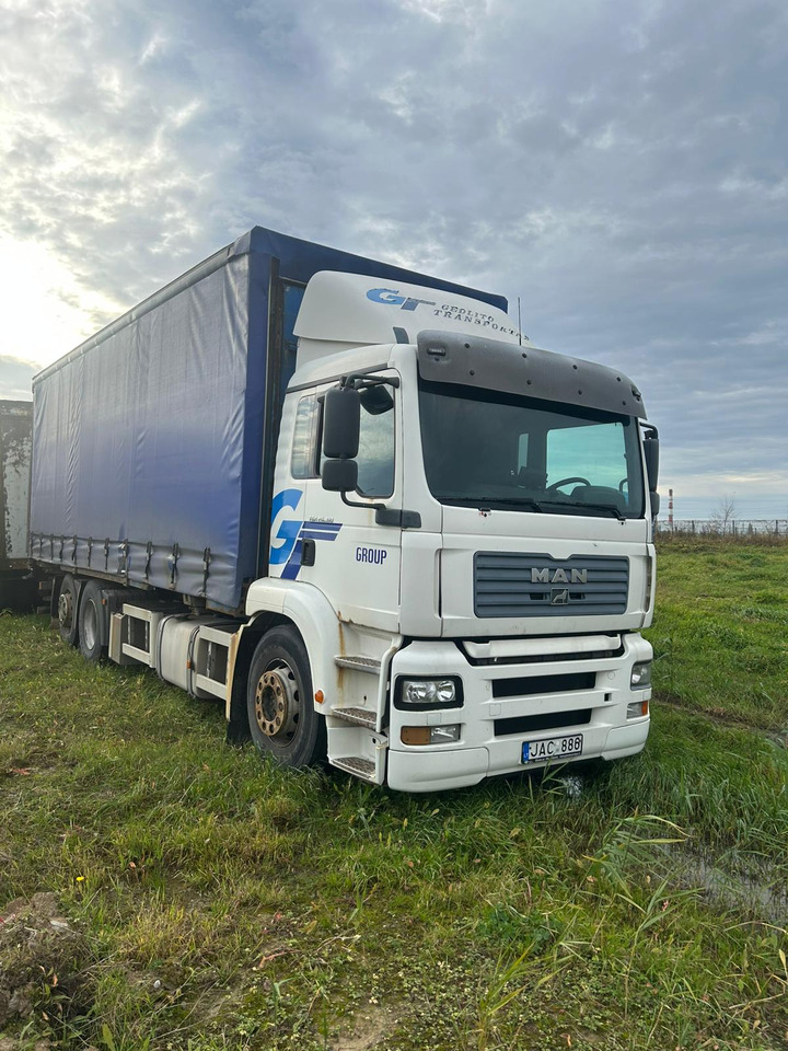 MAN TGA 26.310 - Camión lona: foto 1 MAN TGA 26.310 - Camión lona: foto 1