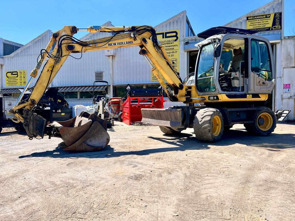 New Holland MH 2.6 PELLE A PNEUS 10T - Excavadora de ruedas: foto 1 New Holland MH 2.6 PELLE A PNEUS 10T - Excavadora de ruedas: foto 1